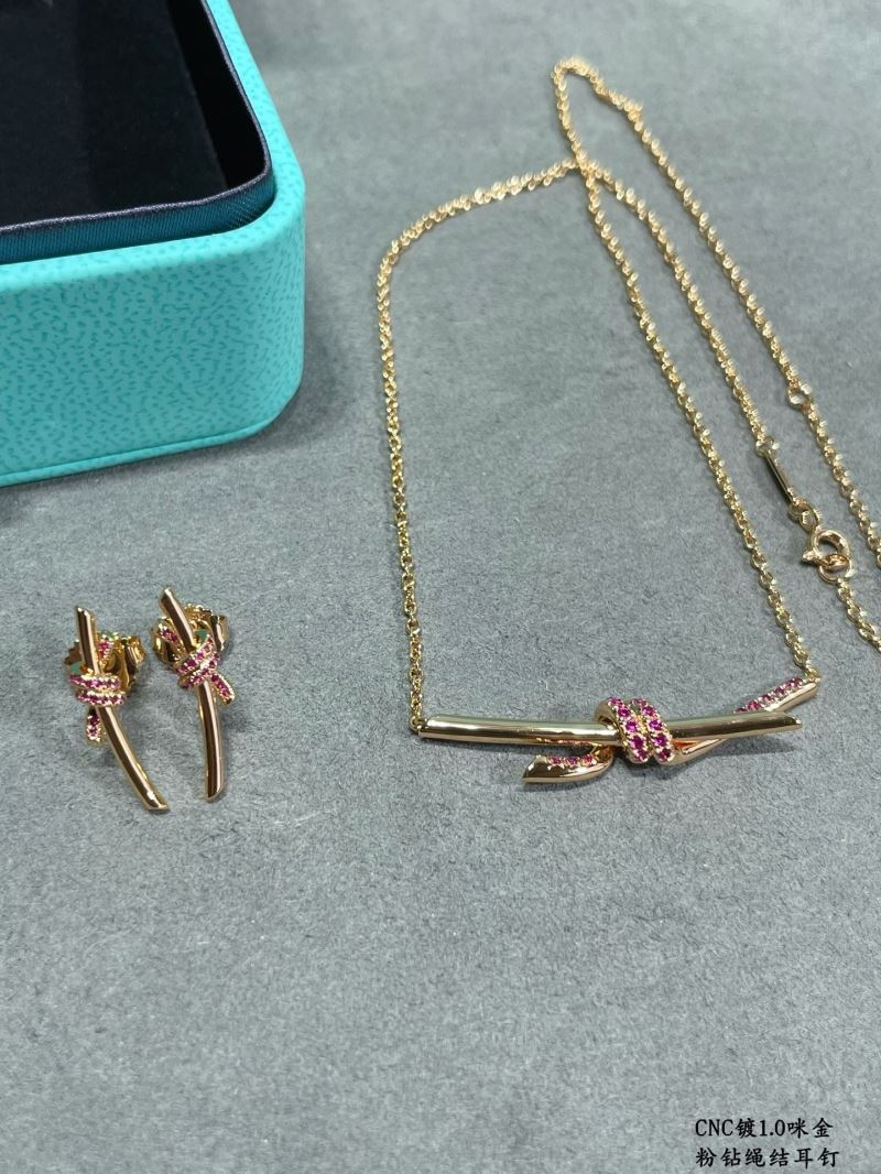 T*f*ny earrings